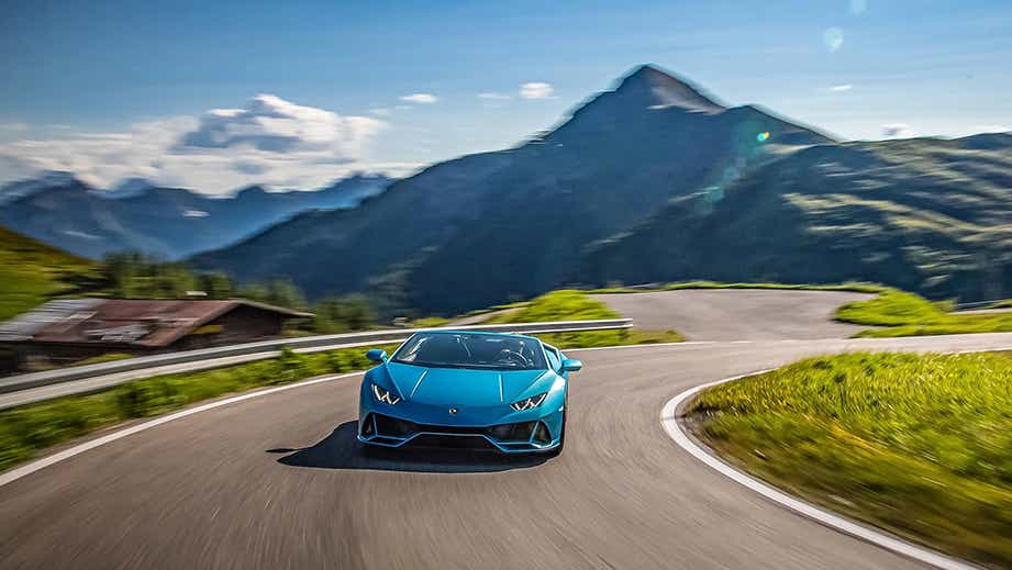 front view of a Blu Nethuns Lamborghini Huracan Evo on a mountain road