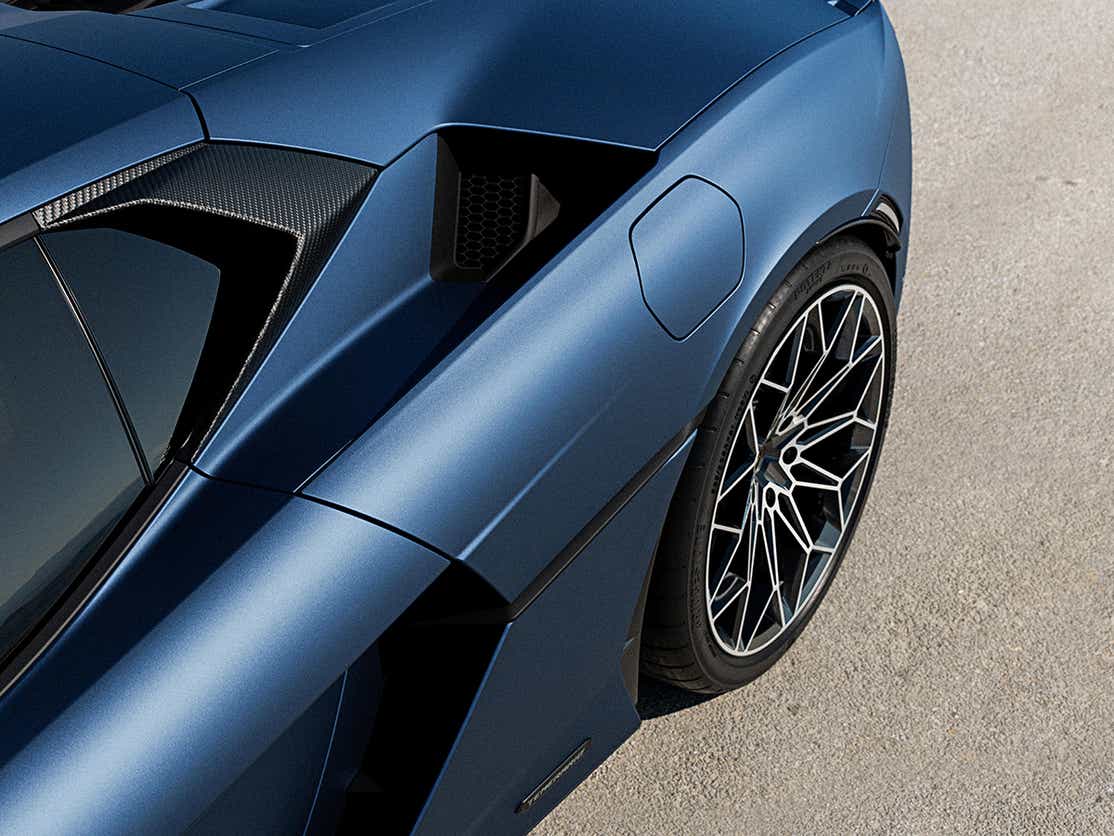 rear quarter panel and wheel of a Blu Eleos Lamborghini Temerario
