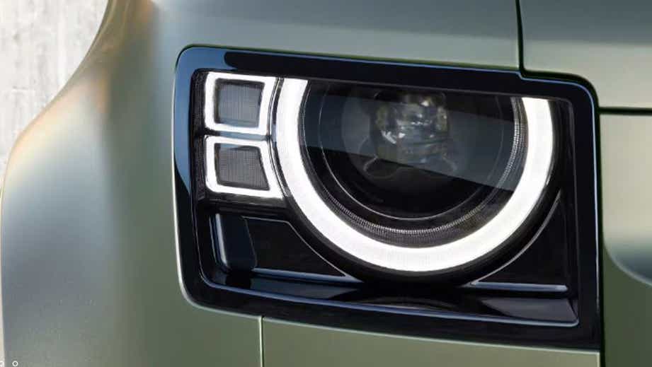 headlight close-up of a Land Rover Defender