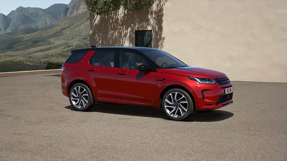 side view of a Firenze Red Land Rover Discovery Sport