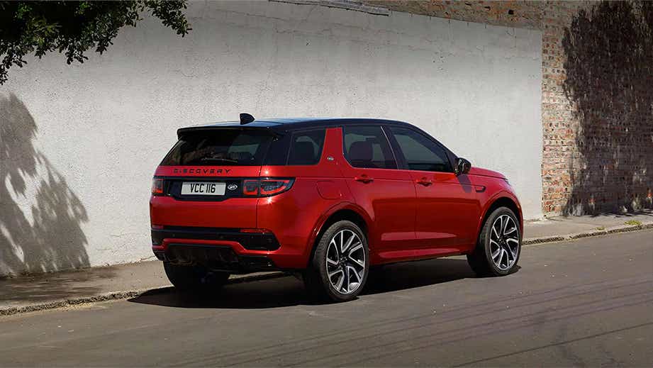 rear three-quarter of a Firenze Red Land Rover Discovery Sport