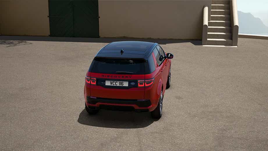 Rear view of a Firenze Red Land Rover Discovery Sport