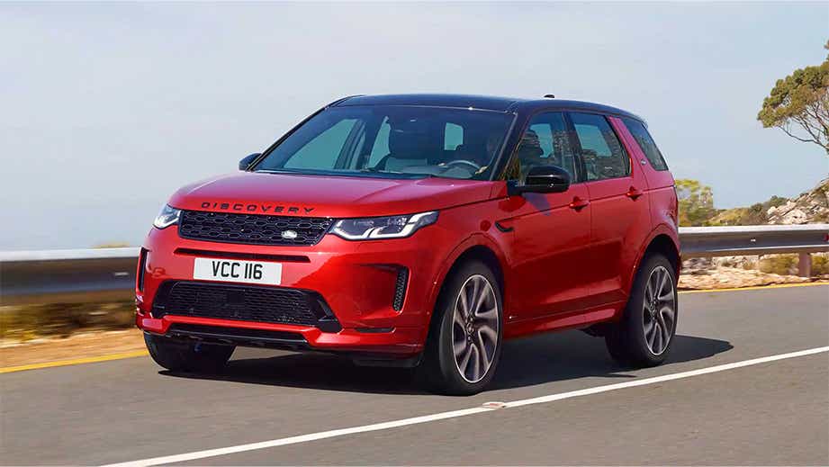 front three-quarter view of a Firenze Red Land Rover Discovery Sport