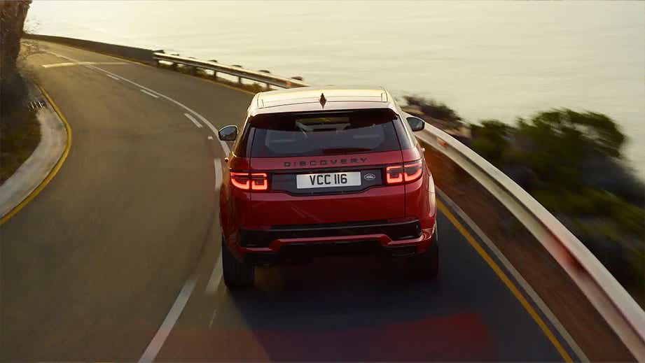 Rear view of a Firenze Red Land Rover Discovery Sport