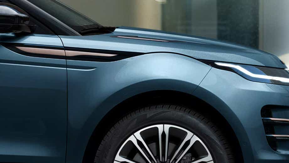 Front wheel arch and headlight area of a Land Rover Range Rover Evoque