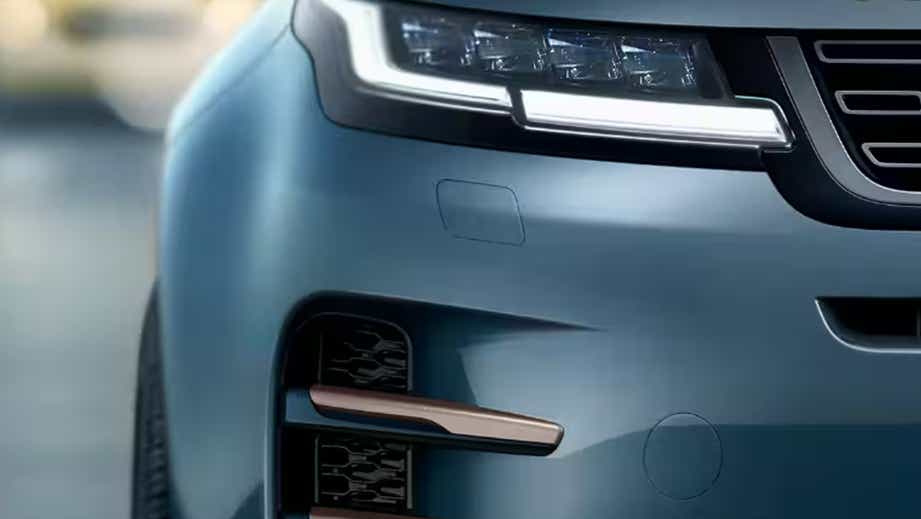 Front headlight close-up of a Land Rover Range Rover Evoque
