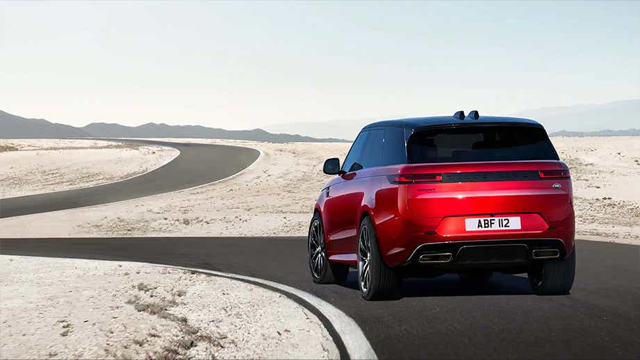 Rear view of a Land Rover Range Rover Sport on a desert road