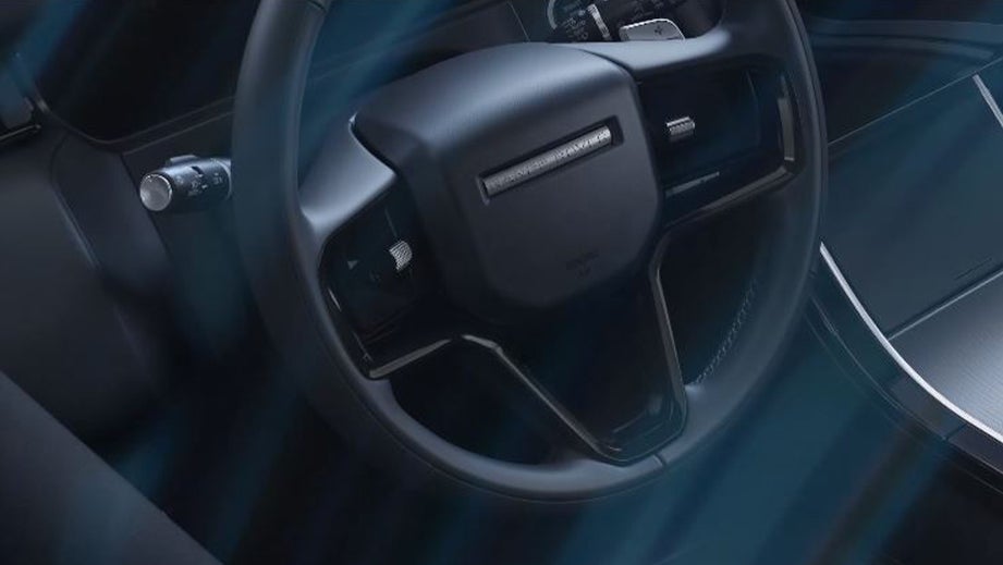 Interior dashboard and steering wheel of a Land Rover Range Rover Velar
