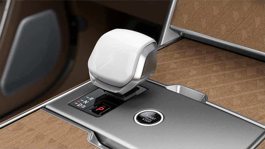Gear selector and start/stop button of a Land Rover Range Rover interior