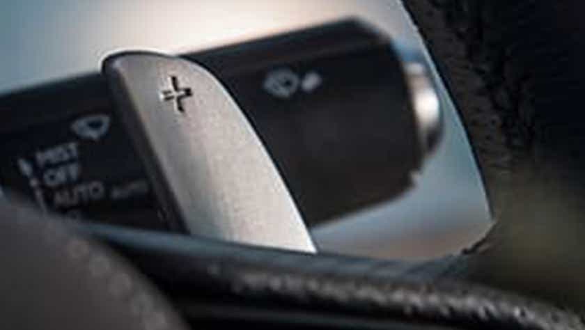 Close-up of steering wheel paddle shifter in a Lexus LC 500h