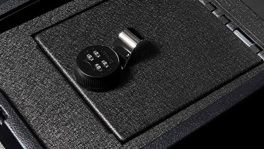 close-up of a center console safe lock in a Lexus NX