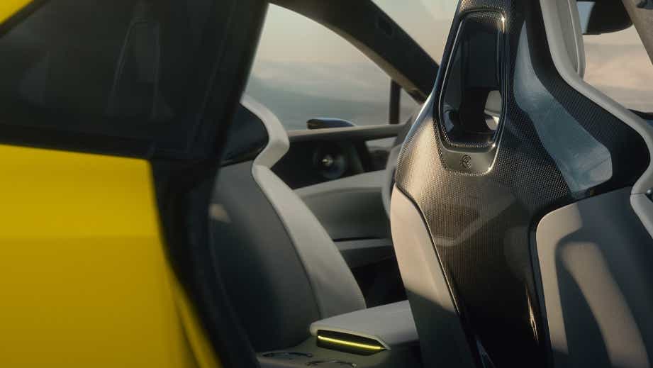 Close-up of rear seats and carbon-fiber seatback in a Lotus Emeya