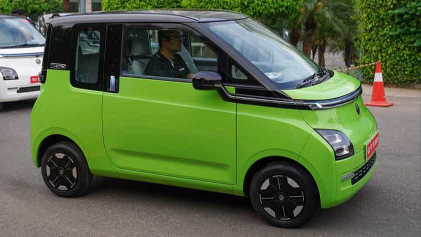 side view of a Apple Green With Starry Black MG Comet EV