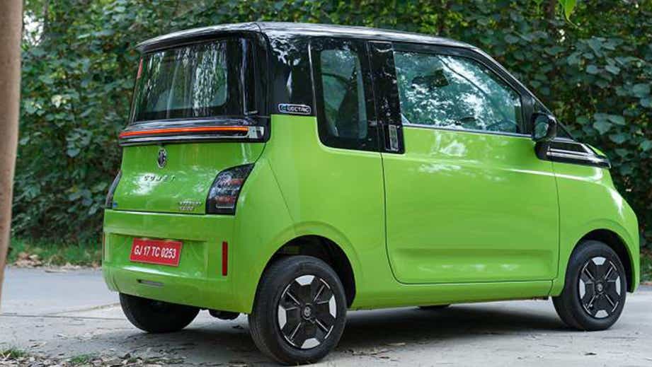 rear three-quarter of a Apple Green With Starry Black MG Comet EV
