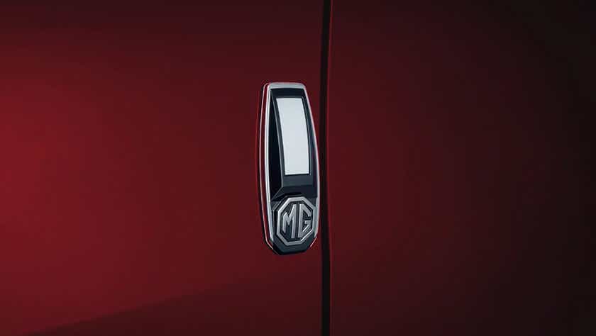 Close-up of door handle with MG logo on an MG Hector