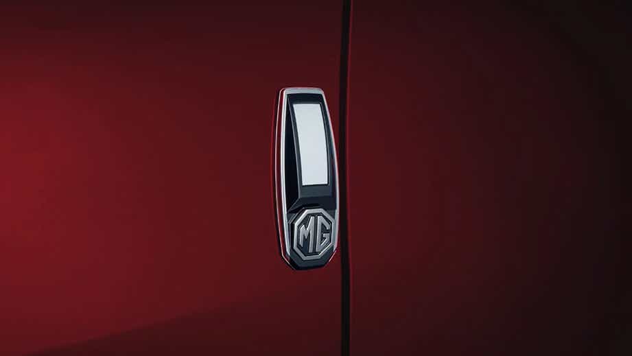 Close-up of door handle with MG logo on an MG Hector
