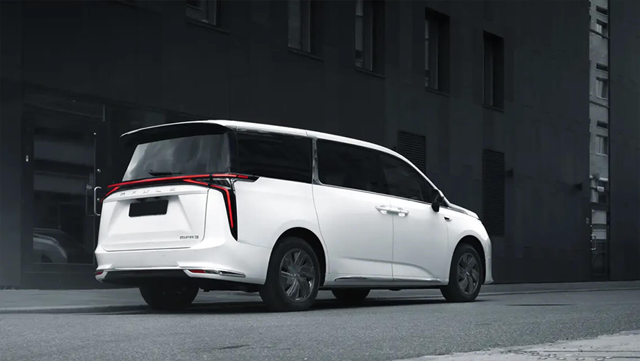 rear three-quarter view of a Pearl White with Black Roof MG M9