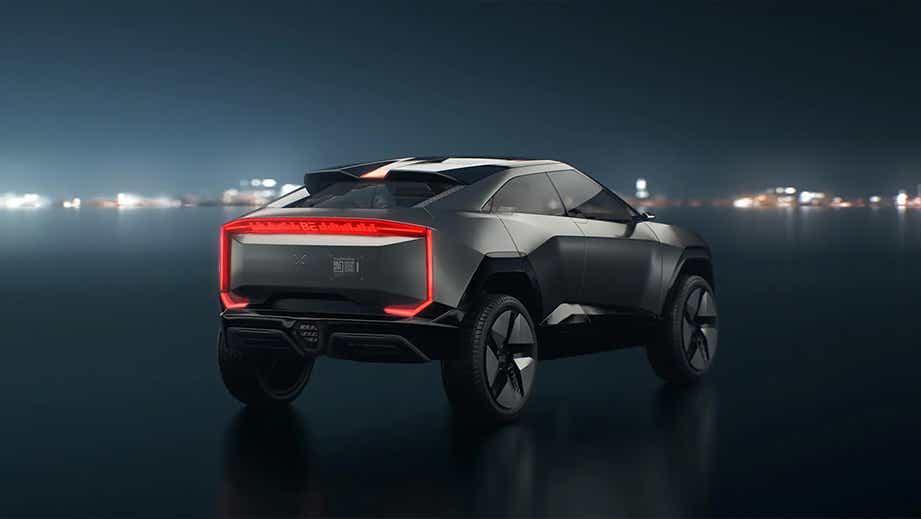 rear three-quarter of a Deep Grey Mahindra BE 05