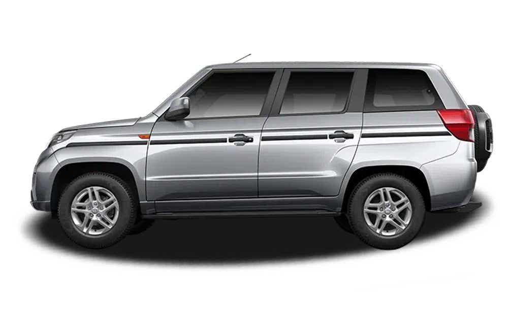 side view of a Majestic Silver Mahindra Bolero Neo Plus