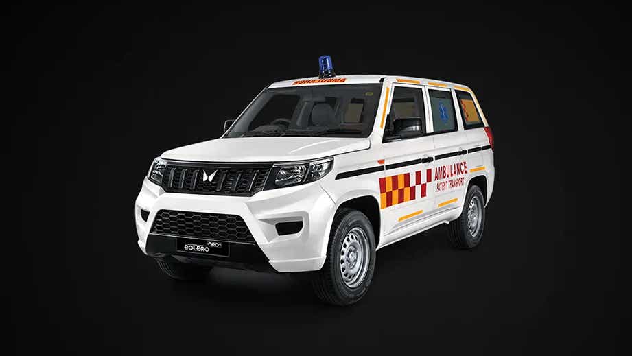 front three-quarter view of a Diamond White Mahindra Bolero Neo Plus