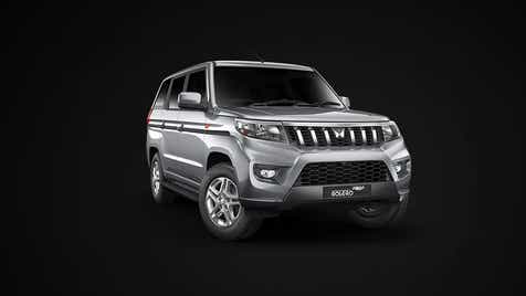 front three-quarter view of a Majestic Silver Mahindra Bolero Neo Plus