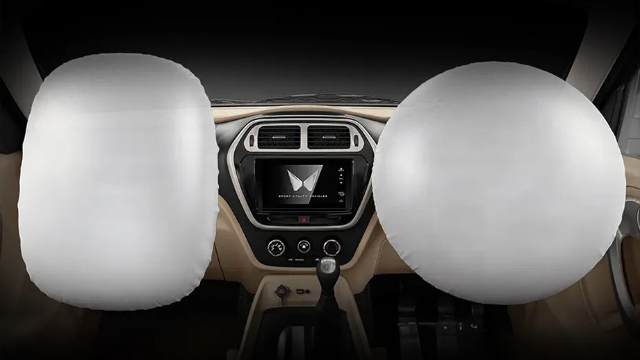 interior dashboard with airbags deployed of a Mahindra Bolero Neo Plus