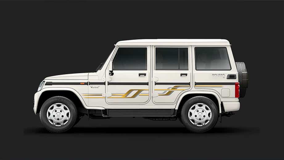 side view of a Diamond White Mahindra Bolero