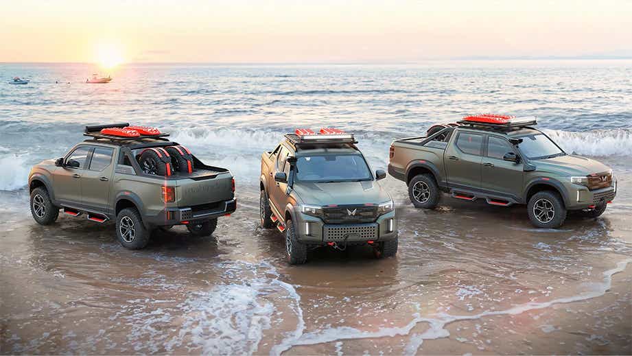 multiple angle views of a Mahindra Global Pik Up on a beach at sunset