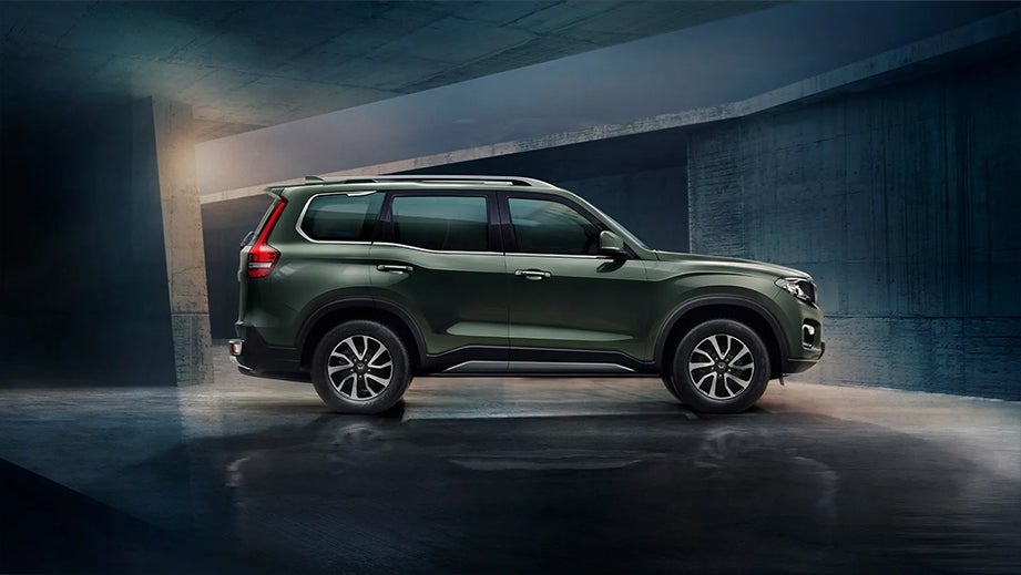 side profile of a Deep Forest Mahindra Scorpio-N