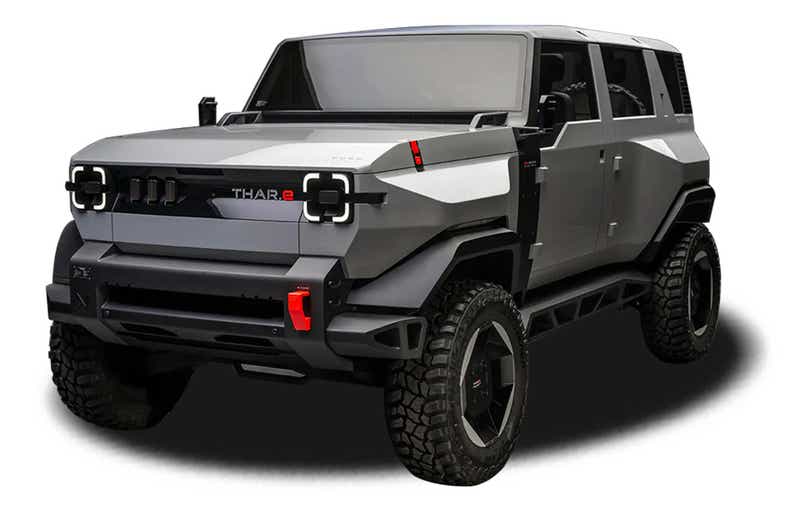 front three-quarter view of a Dazzling Silver Mahindra Thar E