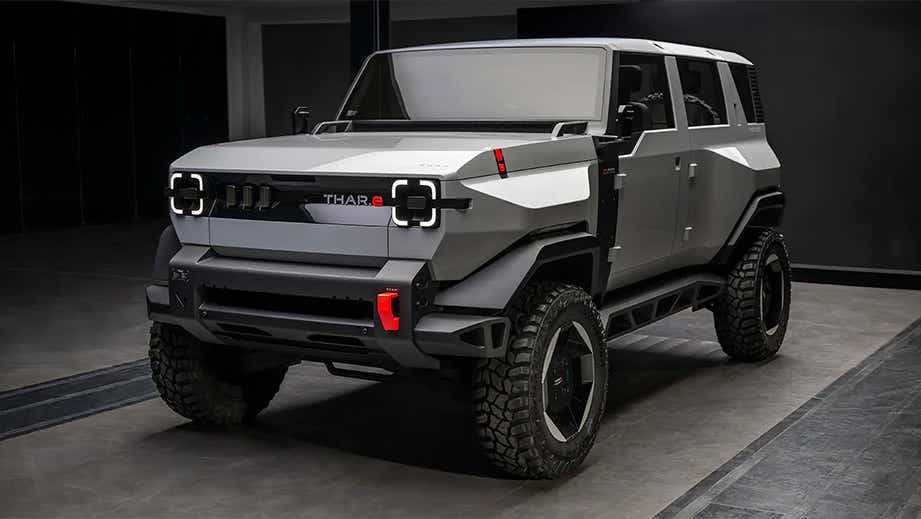 Front view of a Dazzling Silver Mahindra Thar E