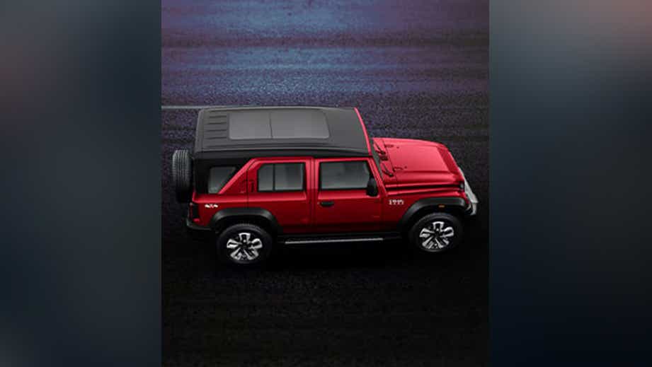 top view of a Tango Red Mahindra Thar ROXX