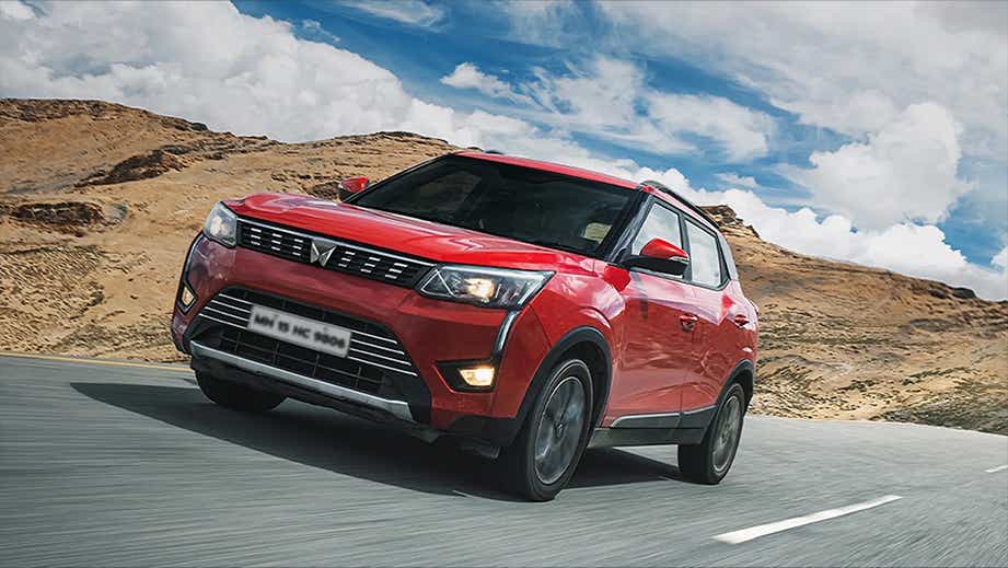 front three-quarter view of a Red Rage Mahindra XUV300
