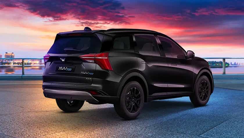 rear three-quarter of a Midnight Black Mahindra XUV700