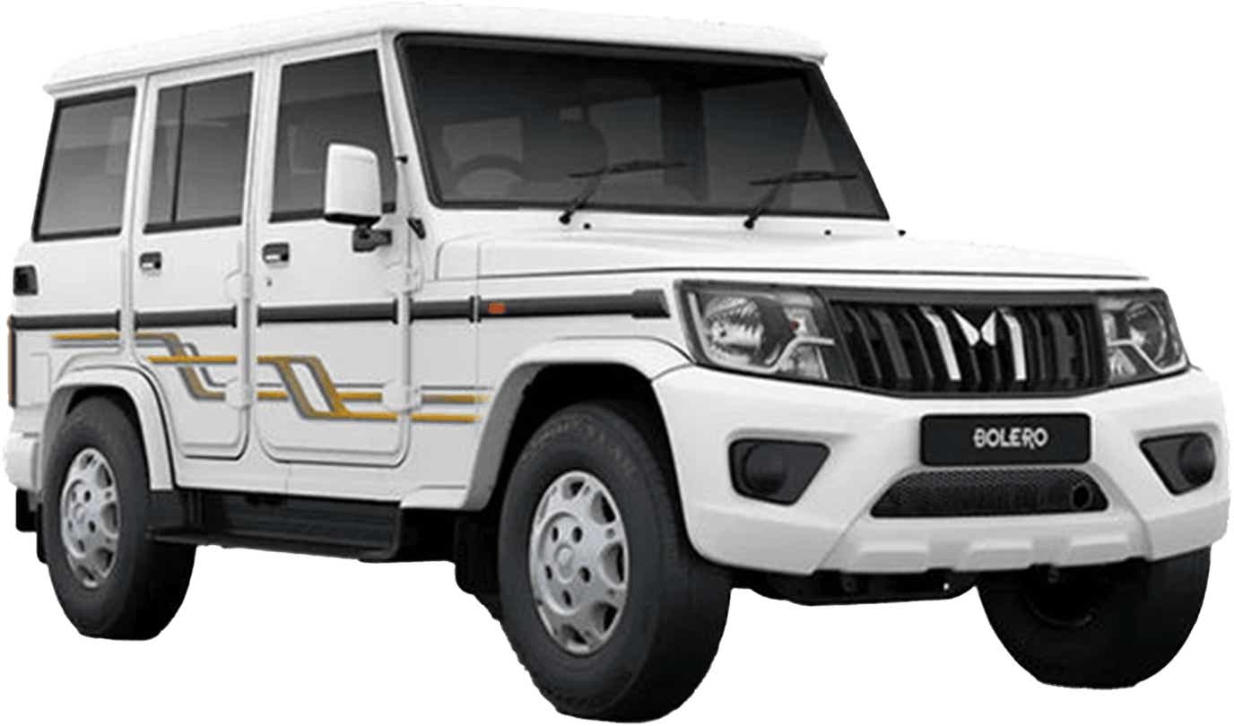 front three-quarter view of a Diamond White Mahindra Bolero