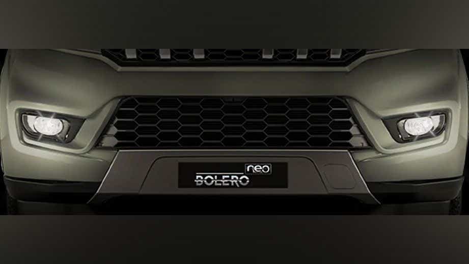 front grille and headlight view of a Mahindra Bolero Neo