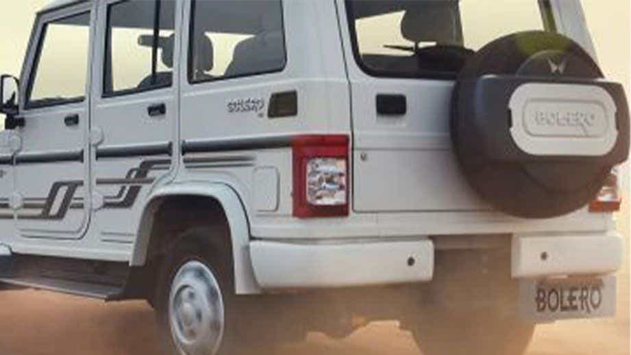 rear three-quarter of a Mahindra Bolero