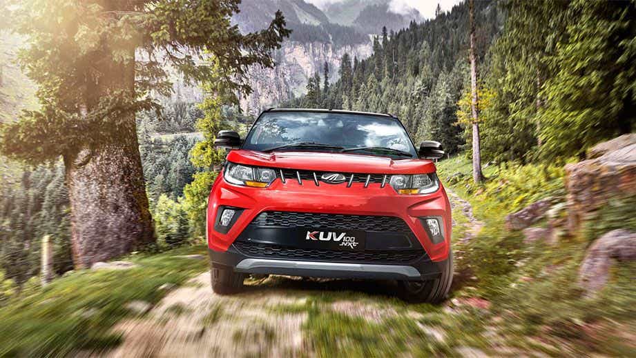 front view of a Flamboyant Red Mahindra KUV 100 NXT