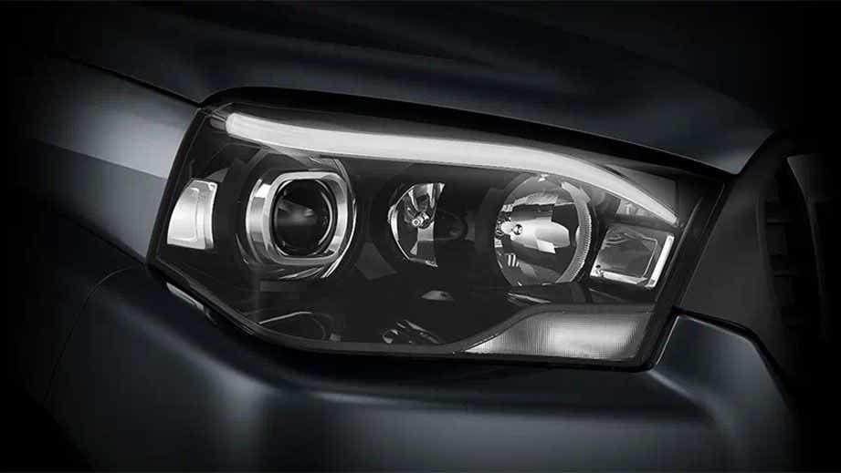 headlight close-up of a Mahindra Scorpio Classic