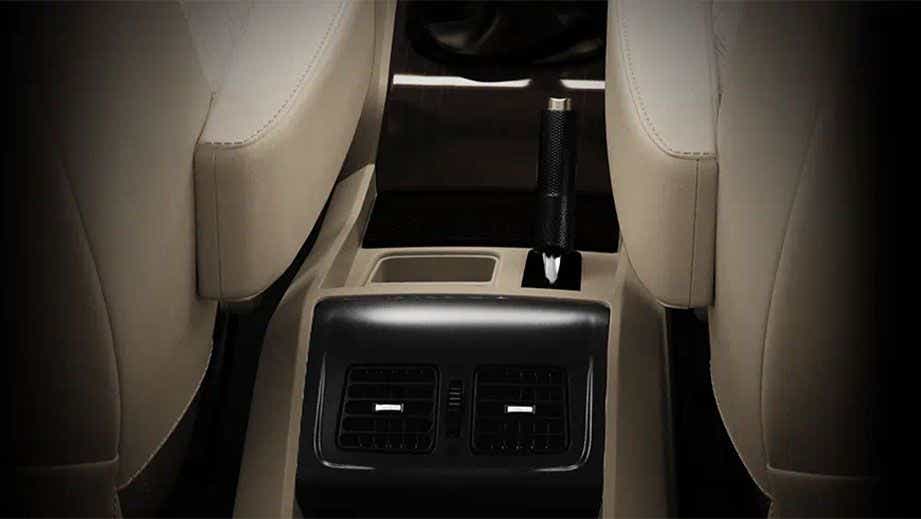 rear AC vents and handbrake of a Mahindra Scorpio Classic