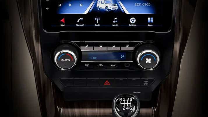 Dashboard controls and gear shifter of a Mahindra Scorpio Classic