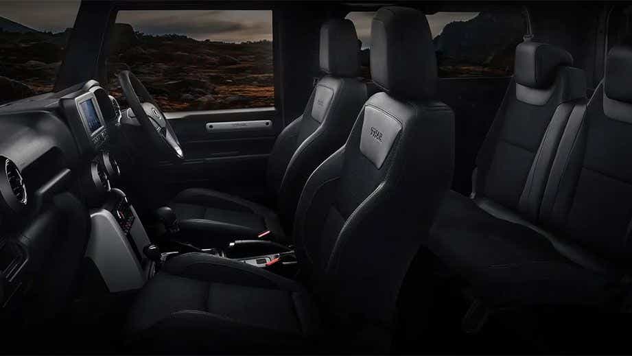 Interior dashboard and front seats of a Mahindra Thar
