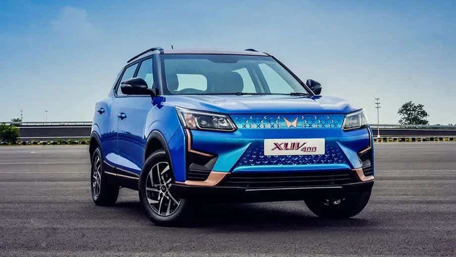 Front three-quarter view of a Infinity Blue Dualtone Mahindra XUV400 EV