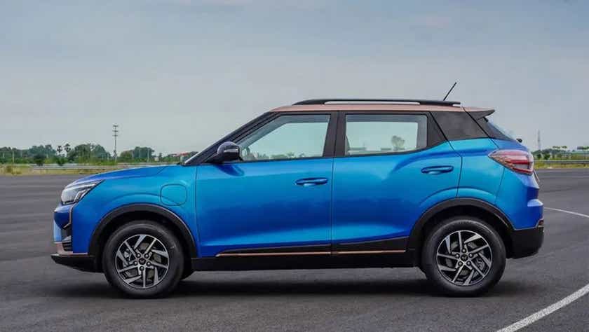 side view of a Infinity Blue Dualtone Mahindra XUV400 EV