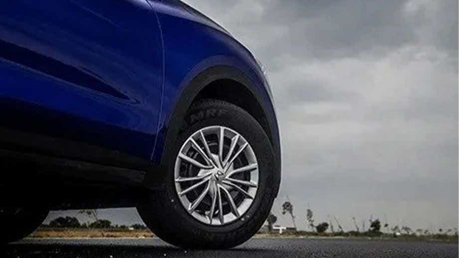 front wheel and fender view of a Mahindra XUV700