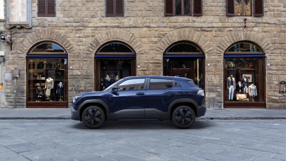 side view of a Nexa Blue Maruti Suzuki e Vitara