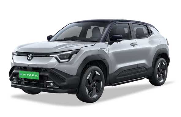 front three-quarter of a Splendid Silver with Bluish Black Roof Maruti Suzuki e Vitara
