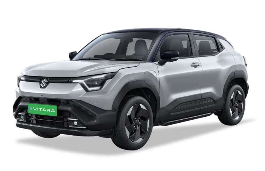 front three-quarter of a Splendid Silver with Bluish Black Roof Maruti Suzuki e Vitara
