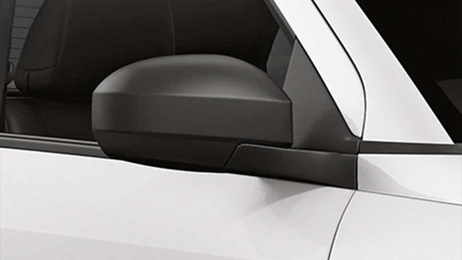 side mirror close-up of a Maruti Suzuki Ertiga Tour