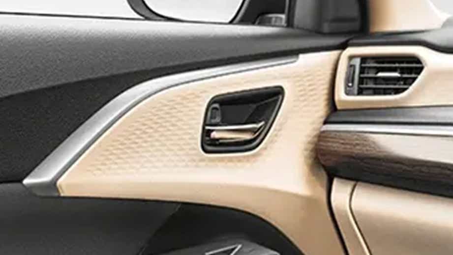front passenger door trim and handle of a Maruti Suzuki Dzire